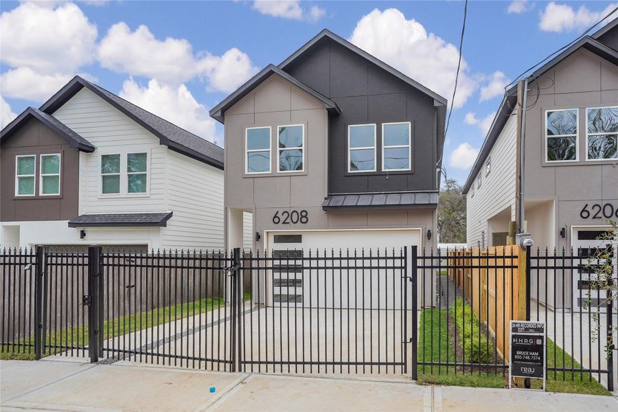 Front exterior of a new home in , Houston, TX, highlighting curb appeal (Image 13).