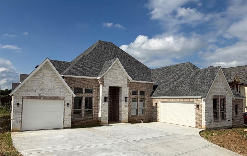 Front exterior of a new home in , Fort Worth, TX, highlighting curb appeal (Image 1). Front exterior of a new home in , Fort Worth, TX, highlighting curb appeal (Image 1).