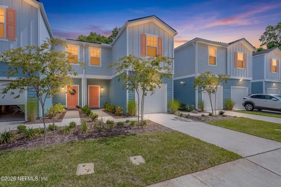 Front exterior of a new home in , Jacksonville, FL, highlighting curb appeal (Image 1). Front exterior of a new home in , Jacksonville, FL, highlighting curb appeal (Image 1).