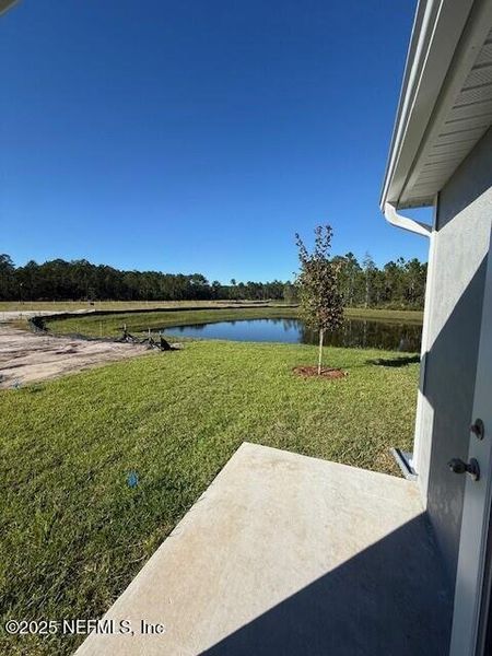 Exterior details and patio area of a home in Grand Reserve, Bunnell (Image 38).