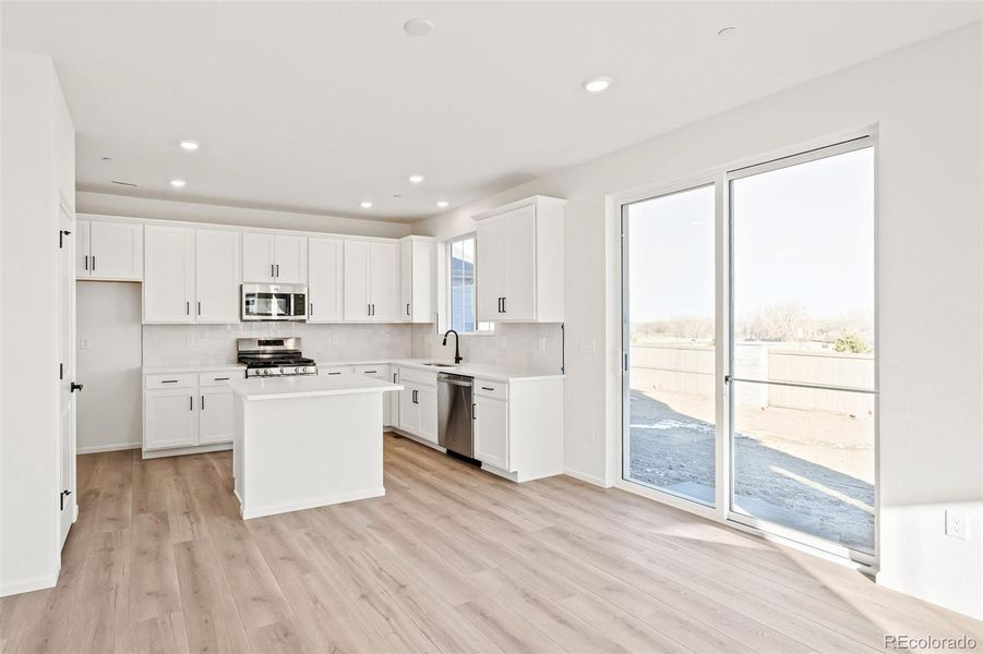 Furnished interior view inside a new home in The Nest Classic at Canyon Creek, Erie (Image 8).