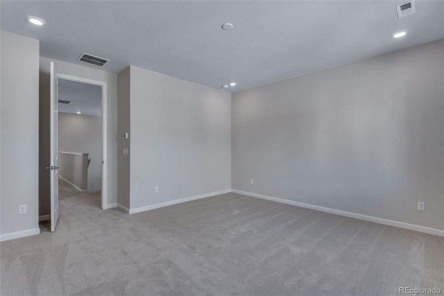 Spacious, unfurnished interior of a new home in Medley at Reunion Ridge, Commerce City (Image 31).
