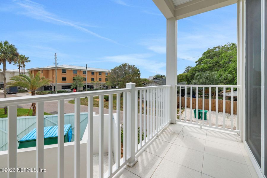 Exterior details and patio area of a home in North Beach Townhomes, Jacksonville Beach (Image 21).