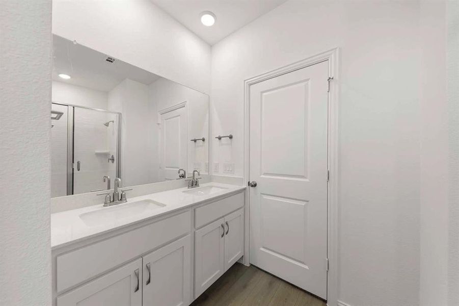 Furnished interior view inside a new home in Coyote Meadows, Anna (Image 9).
