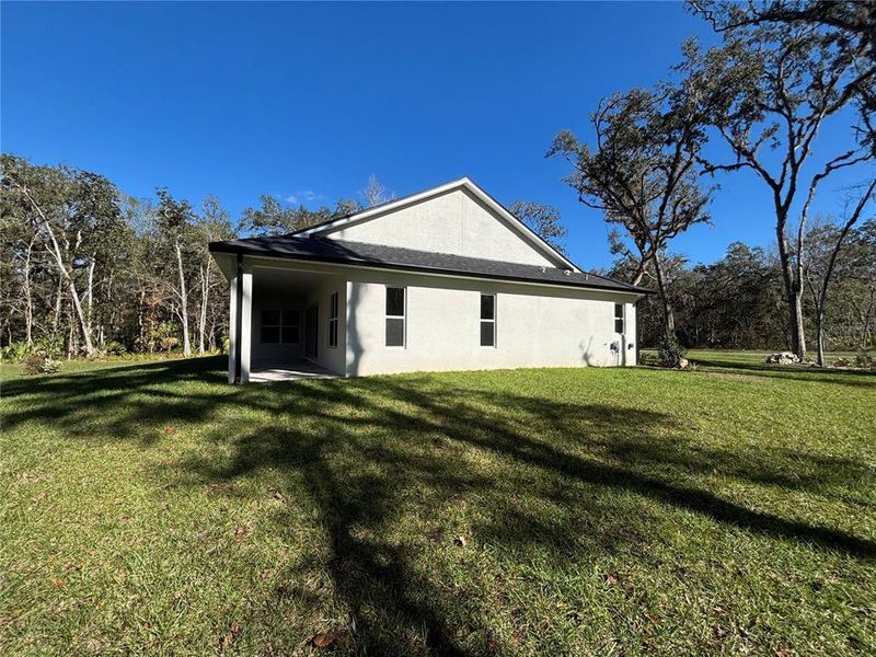 Exterior details and patio area of a home in , Brooksville (Image 21).