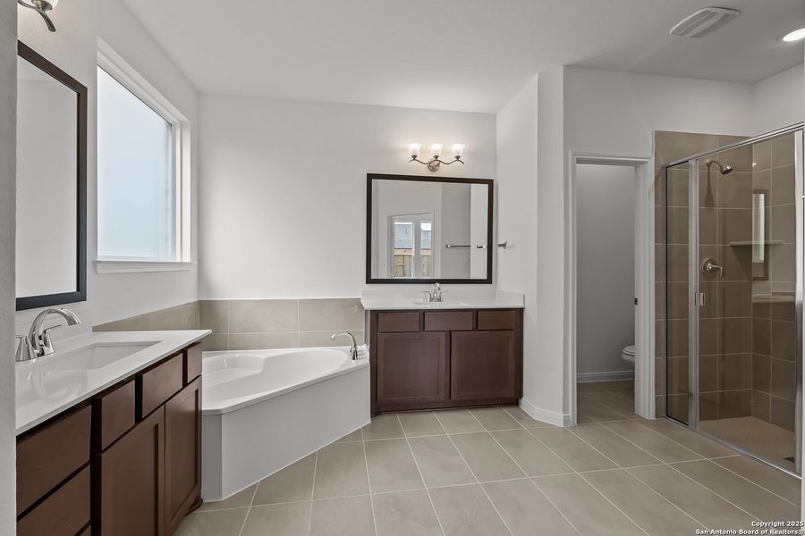 Furnished interior view inside a new home in Homestead 75', Schertz (Image 14).