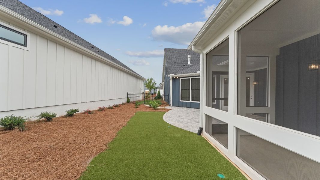 Exterior details and patio area of a home in The Courtyards at Redbud Lane, Canton (Image 25). Exterior details and patio area of a home in The Courtyards at Redbud Lane, Canton (Image 25).