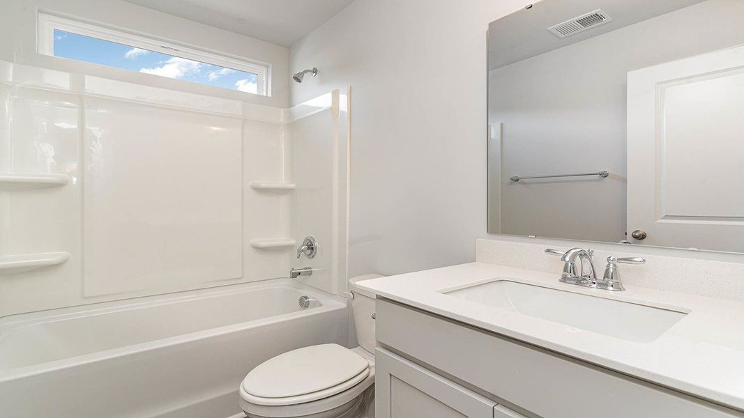 Representative furnished interior of a home built from the FORRESTER by D.R. Horton in Haven View, Murrells Inlet (Image 11).