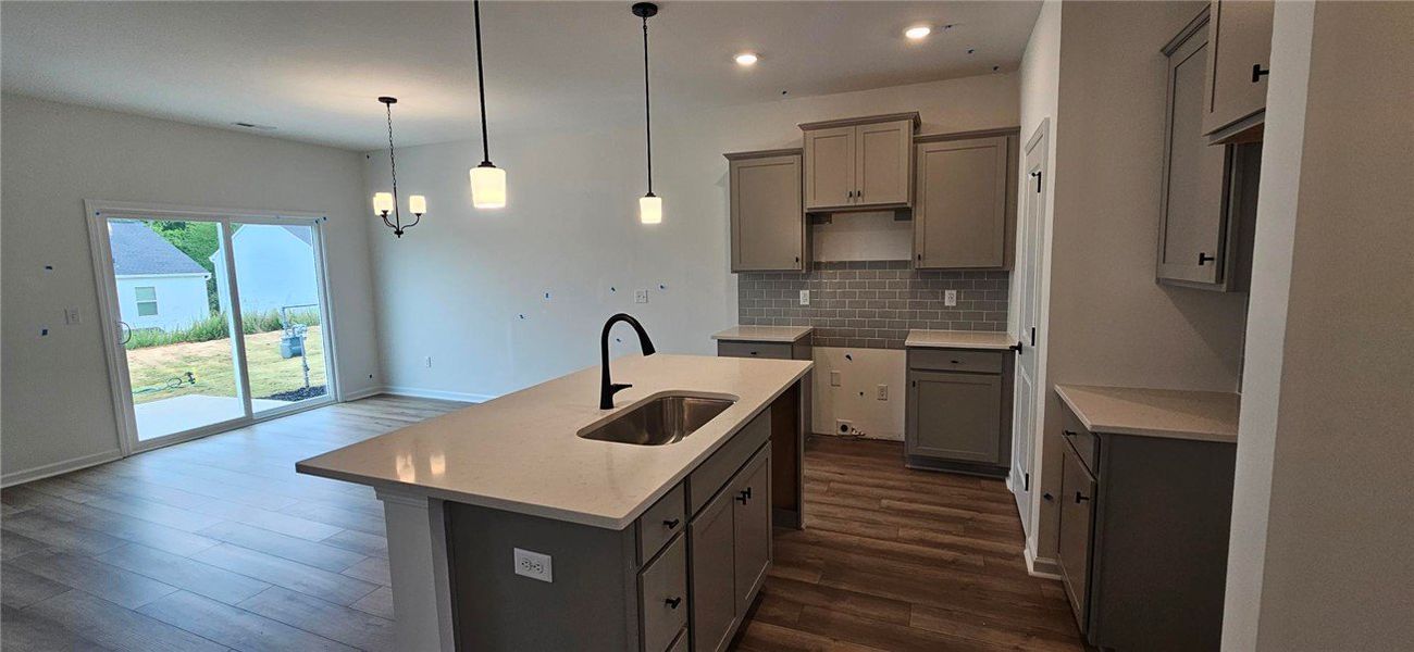 This functional kitchen features a spacious island