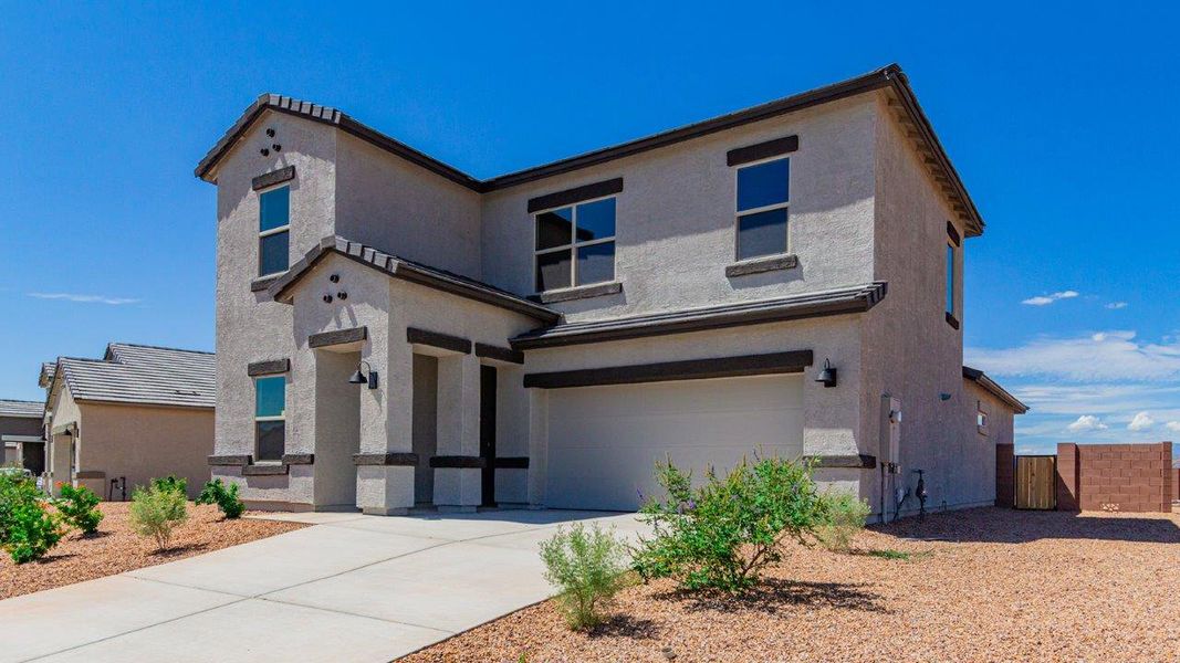 Representative exterior photo of a completed home built from the River by D.R. Horton in The Oasis at Rocking K, Vail, AZ (Image 16).