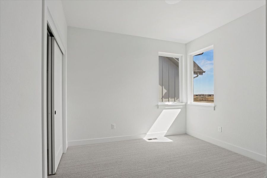 Spacious, unfurnished interior of a new home in West Grange, Longmont (Image 35).