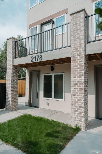 Front exterior of a new home in , Denver, CO, highlighting curb appeal (Image 24).