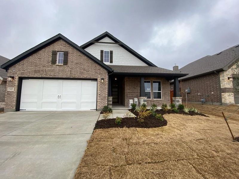 Front exterior of a new home in Morningstar, Aledo, TX, highlighting curb appeal (Image 2). Front exterior of a new home in Morningstar, Aledo, TX, highlighting curb appeal (Image 2).