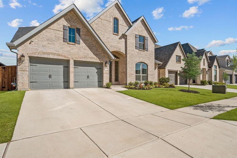 Front exterior of a new home in Walsh, Fort Worth, TX, highlighting curb appeal (Image 21).