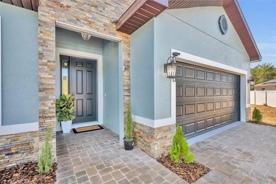 Exterior details and patio area of a home in , Poinciana (Image 2). Exterior details and patio area of a home in , Poinciana (Image 2).
