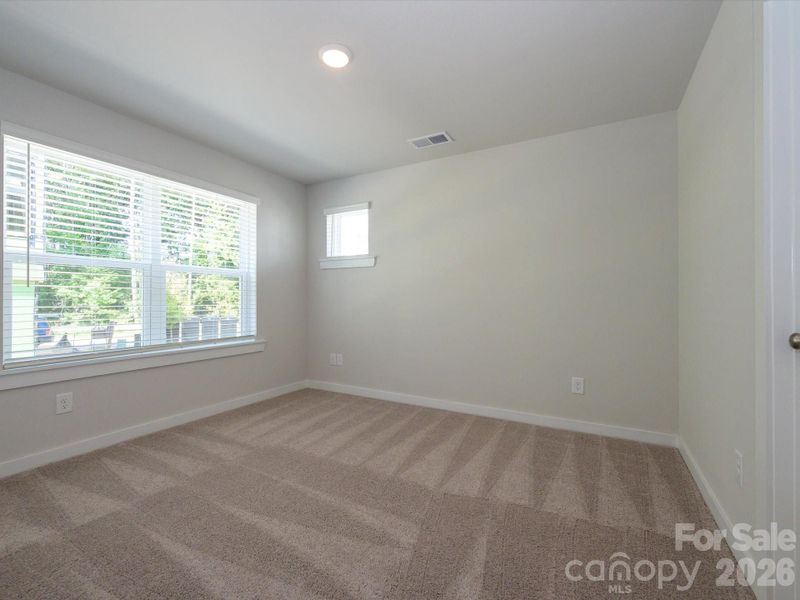 Spacious, unfurnished interior of a new home in Central Living at Craig, Charlotte (Image 18).
