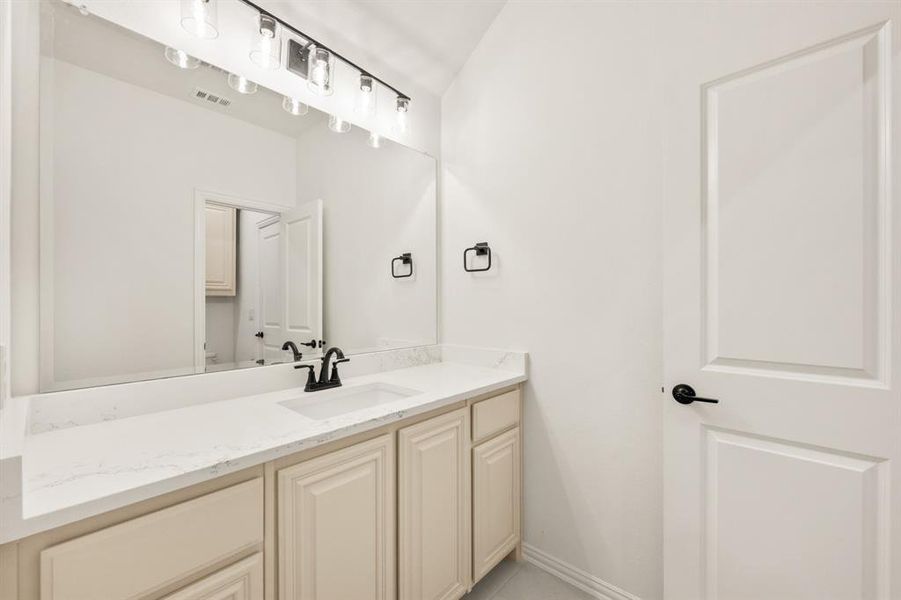 Furnished interior view inside a new home in Villages of Hurricane Creek, Anna (Image 18).