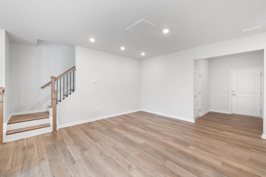 Spacious, unfurnished interior of a new home in Poets Walk, Whitsett (Image 19).