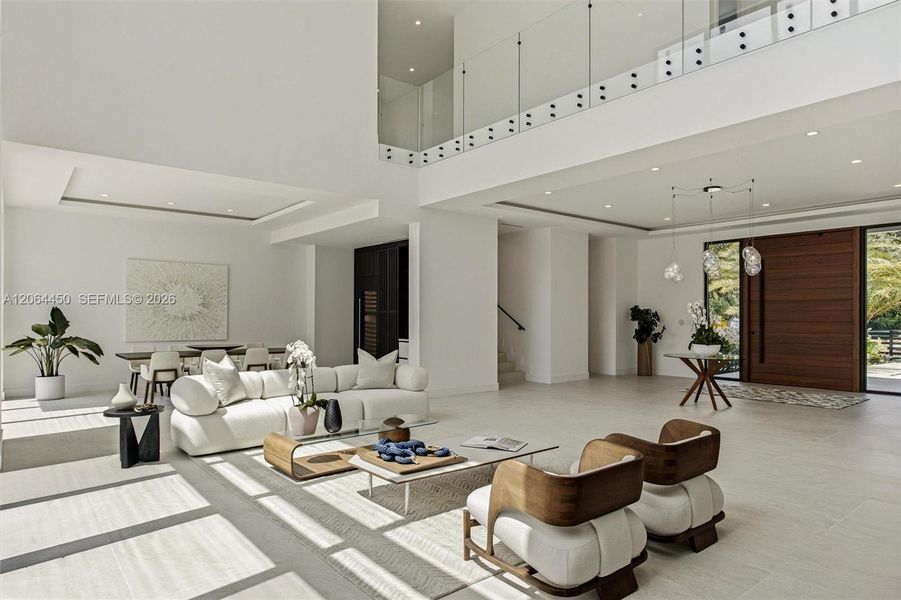 Great room with high ceilings and natural light