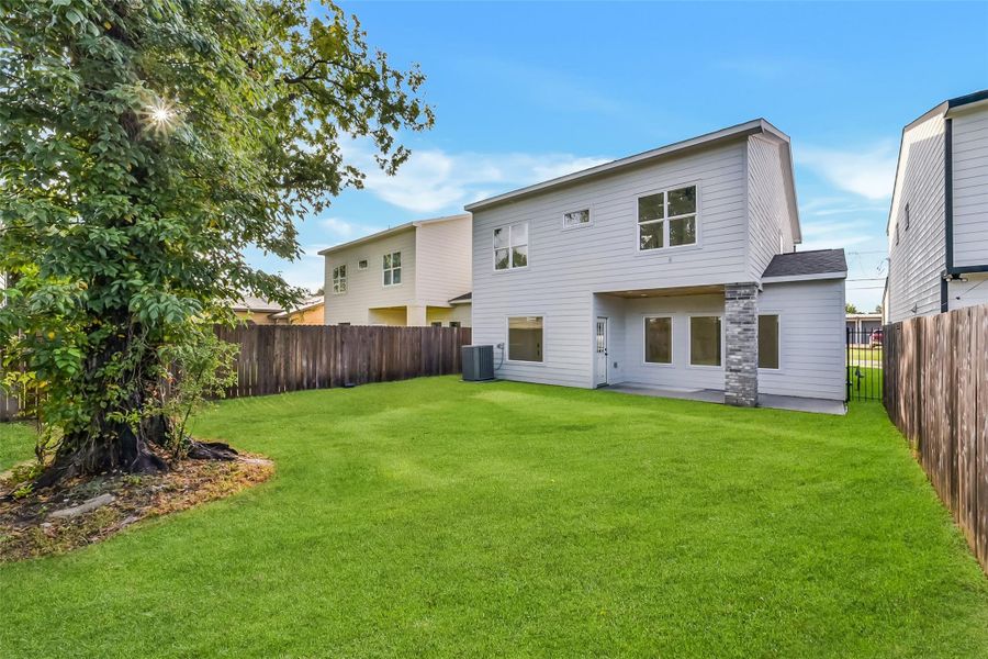 Spacious fenced backyard.