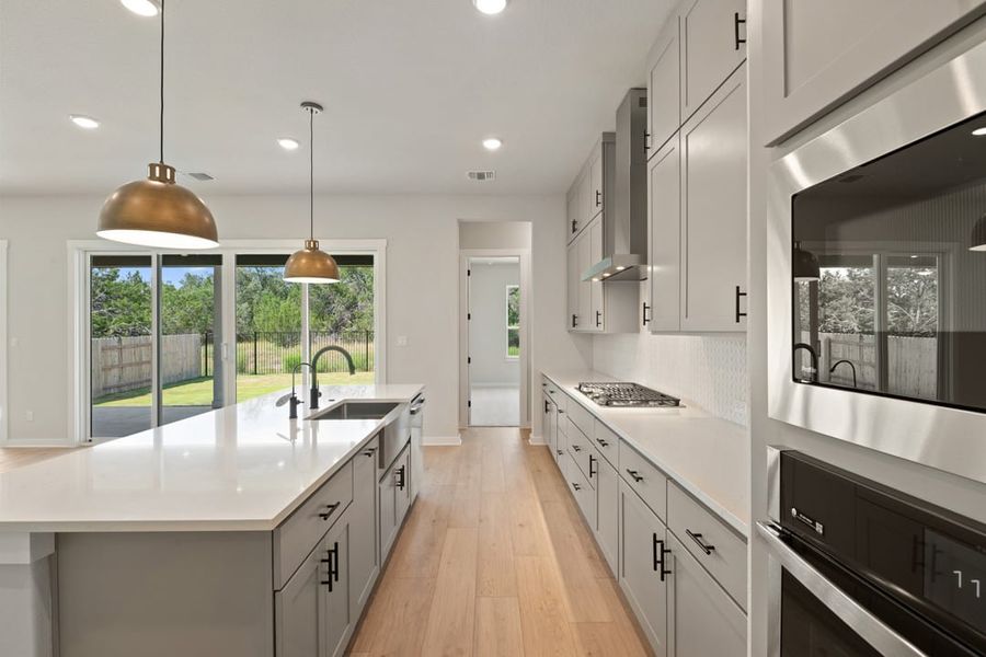 Furnished interior view inside a new home in Capitol Collection at Lariat, Liberty Hill (Image 11). Furnished interior view inside a new home in Capitol Collection at Lariat, Liberty Hill (Image 11).