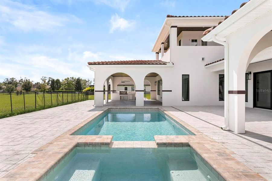 Exterior details and patio area of a home in , Lithia (Image 29).
