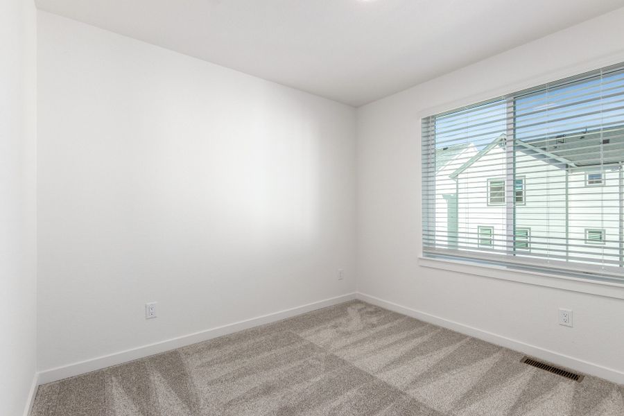 Spacious, unfurnished interior of a new home in Parkside at Victory Ridge, Colorado Springs (Image 26).