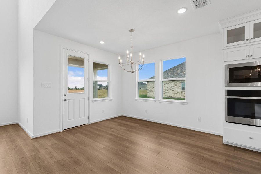 Sun-lit dining area Sun-lit dining area