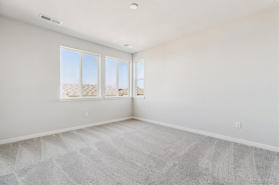 Spacious, unfurnished interior of a new home in Floret Collection at Alder Creek, Parker (Image 18).