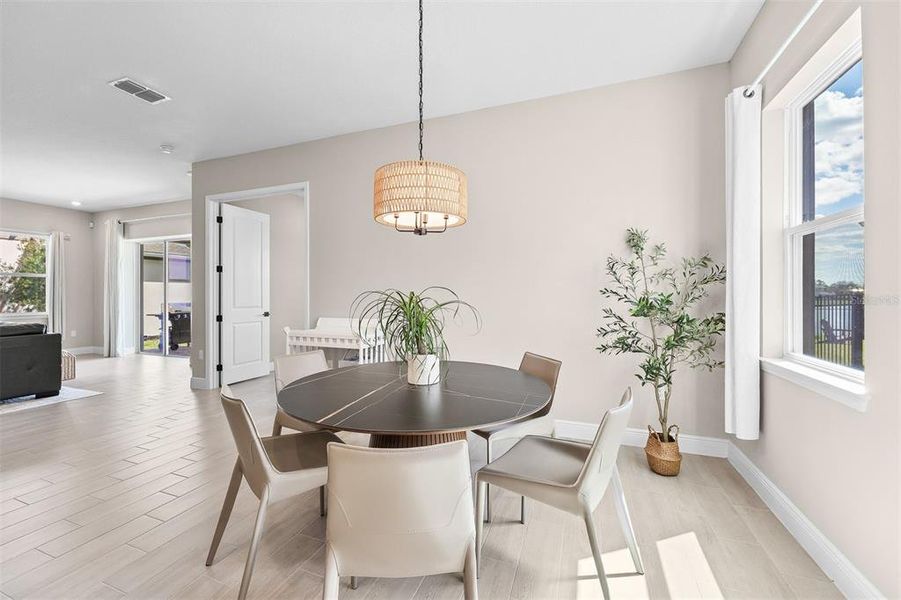 Furnished interior view inside a new home in Laureate Park, Orlando (Image 9).