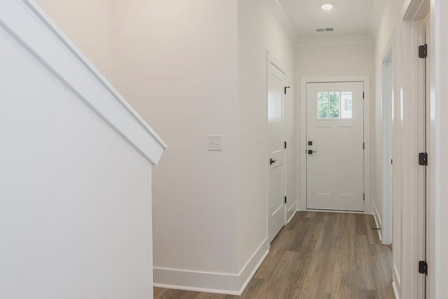 Representative unfurnished interior of a home built from the 1808 Townhome by Adams Homes in Parkstone Place Townhomes, Roebuck (Image 8). Representative unfurnished interior of a home built from the 1808 Townhome by Adams Homes in Parkstone Place Townhomes, Roebuck (Image 8).