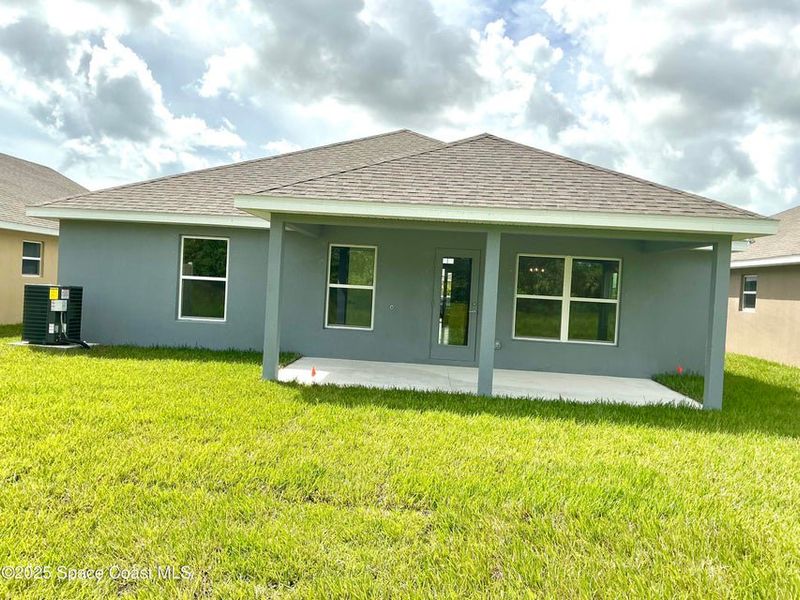 Exterior details and patio area of a home in St. John Preserve, Palm Bay (Image 2). Exterior details and patio area of a home in St. John Preserve, Palm Bay (Image 2).