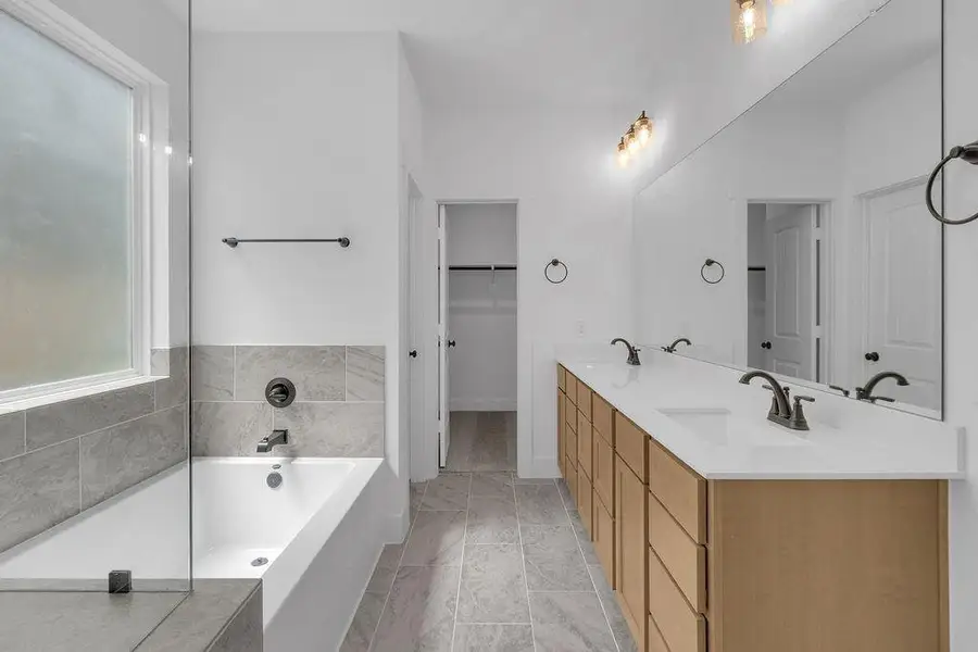 With thoughtful storage solutions tucked away, everything you need is at your fingertips, while maintaining a clean, uncluttered look.