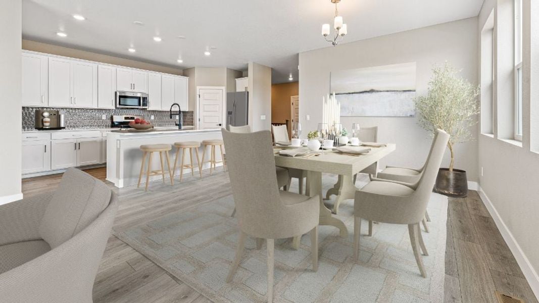 Representative furnished interior of a home built from the Pike by Taylor Morrison in The Aurora Highlands Town Collection, Aurora (Image 10).