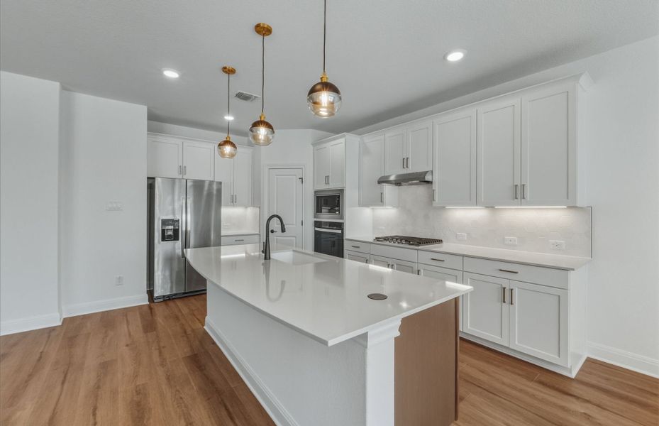 Furnished interior view inside a new home in Horizon Lake, Leander (Image 7).