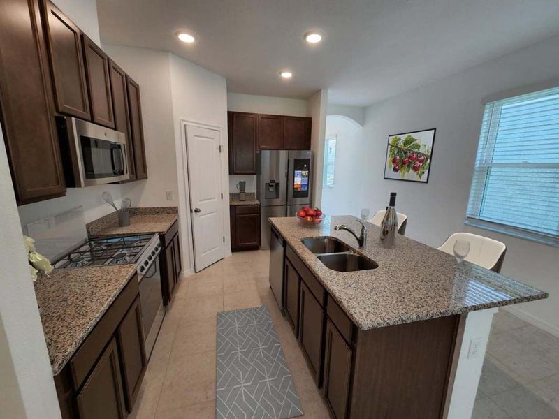 Furnished interior view inside a new home in The Sanctuary – Coastal Collection, Punta Gorda (Image 23).