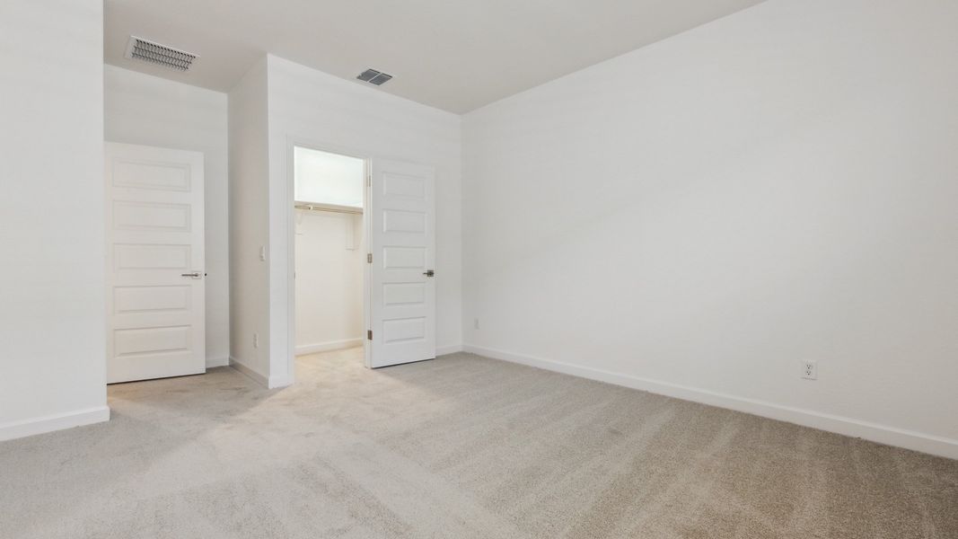 Spacious, unfurnished interior of a new home in Zanjero Pass, Waddell (Image 22).