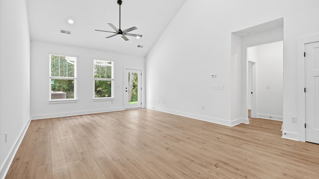 Spacious and stylish family room with vaulted ceilings that create a bright and open atmosphere in Anderson, SC Spacious and stylish family room with vaulted ceilings that create a bright and open atmosphere in Anderson, SC