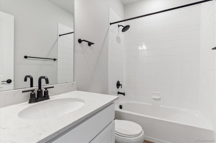 Furnished interior view inside a new home in Townhome Collection at Grand Vue at Interlocken, Broomfield (Image 6).