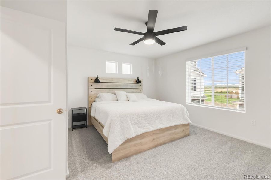 Furnished interior view inside a new home in Thompson River Ranch, Johnstown (Image 6).