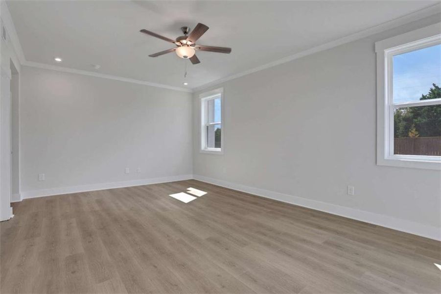 Spacious, unfurnished interior of a new home in The Paddocks at Doc Hughes, Buford (Image 14).