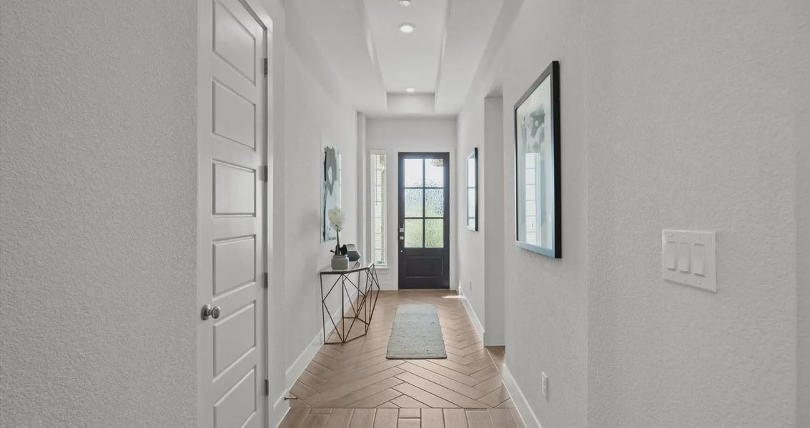 Representative unfurnished interior of a home built from the Wyatt by Chesmar Homes in 6 Creeks, Kyle (Image 13).