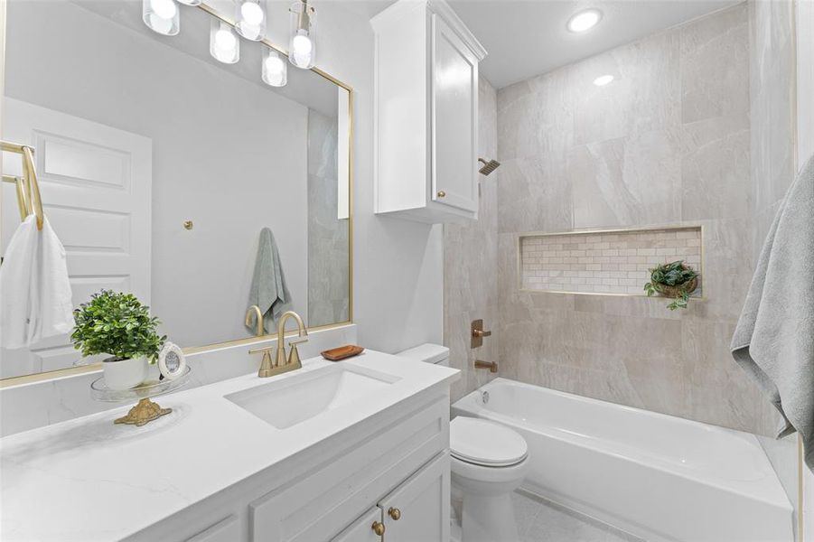 Full bath featuring toilet, vanity, tile patterned floors, recessed lighting, and shower / tub combination Full bath featuring toilet, vanity, tile patterned floors, recessed lighting, and shower / tub combination