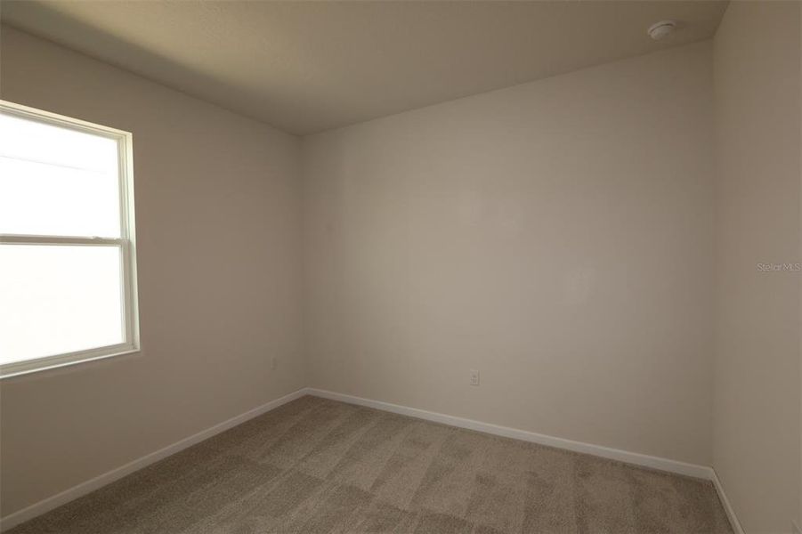 Spacious, unfurnished interior of a new home in Estates at Rivercrest, Sanford (Image 27).