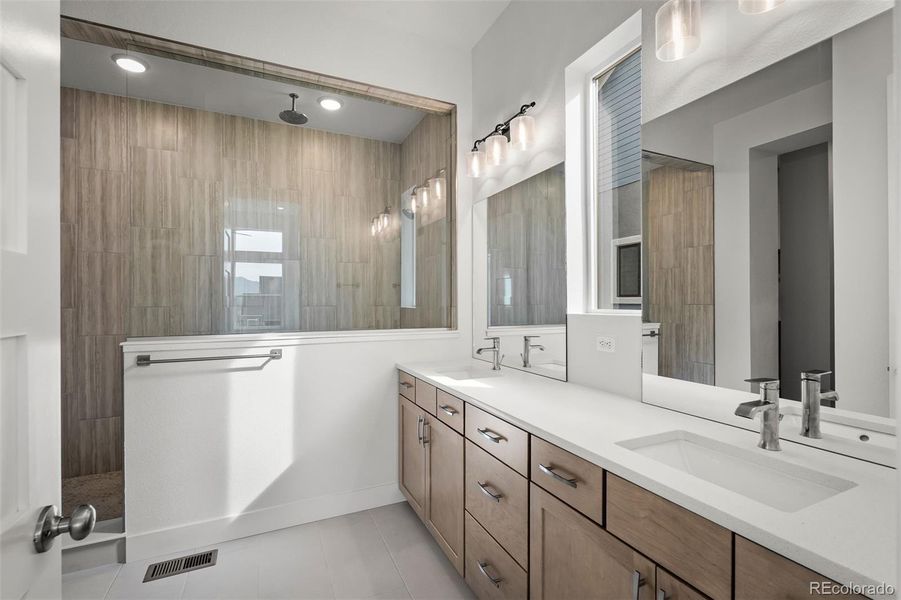 Furnished interior view inside a new home in Cloverleaf - Pinnacle Collection, Monument (Image 18).