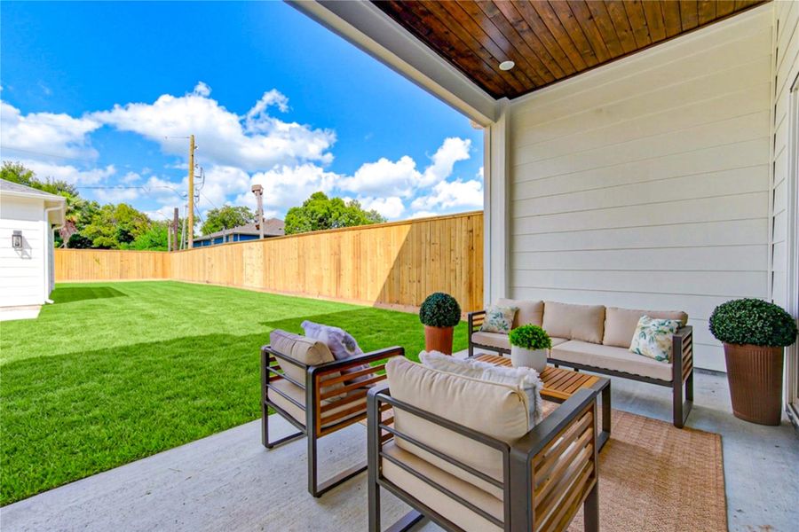 Covered back patio opens to an impressively spacious backyard with plenty of room to bring your outdoor vision to life. Enjoy shaded seating for morning coffee or evening gatherings, with an expansive lawn offering exciting possibilities for a future pool, outdoor kitchen, garden, or play space. Covered back patio opens to an impressively spacious backyard with plenty of room to bring your outdoor vision to life. Enjoy shaded seating for morning coffee or evening gatherings, with an expansive lawn offering exciting possibilities for a future pool, outdoor kitchen, garden, or play space.