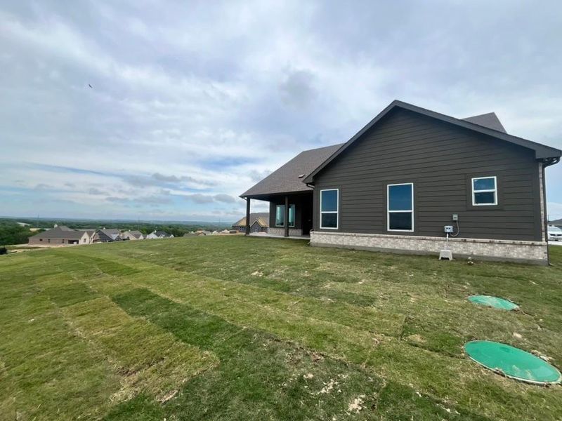 Exterior details and patio area of a home in Eagle Ridge Estates, Weatherford (Image 3).