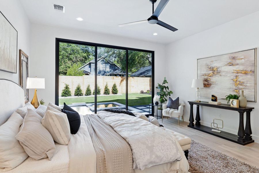 Bedroom with access to exterior, wood finished floors, recessed lighting, and a ceiling fan