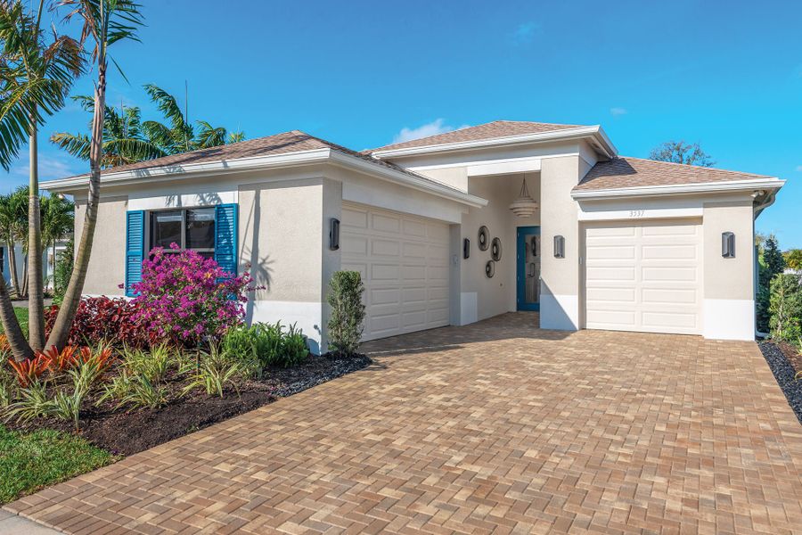 Representative exterior photo of a completed home built from the Grenada by GL Homes in Valencia Harbor (55+), Fort Myers, FL (Image 1). Representative exterior photo of a completed home built from the Grenada by GL Homes in Valencia Harbor (55+), Fort Myers, FL (Image 1).