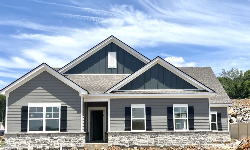 Front exterior of a new home in Brewer Point, Murfreesboro, TN, highlighting curb appeal (Image 1). Front exterior of a new home in Brewer Point, Murfreesboro, TN, highlighting curb appeal (Image 1).
